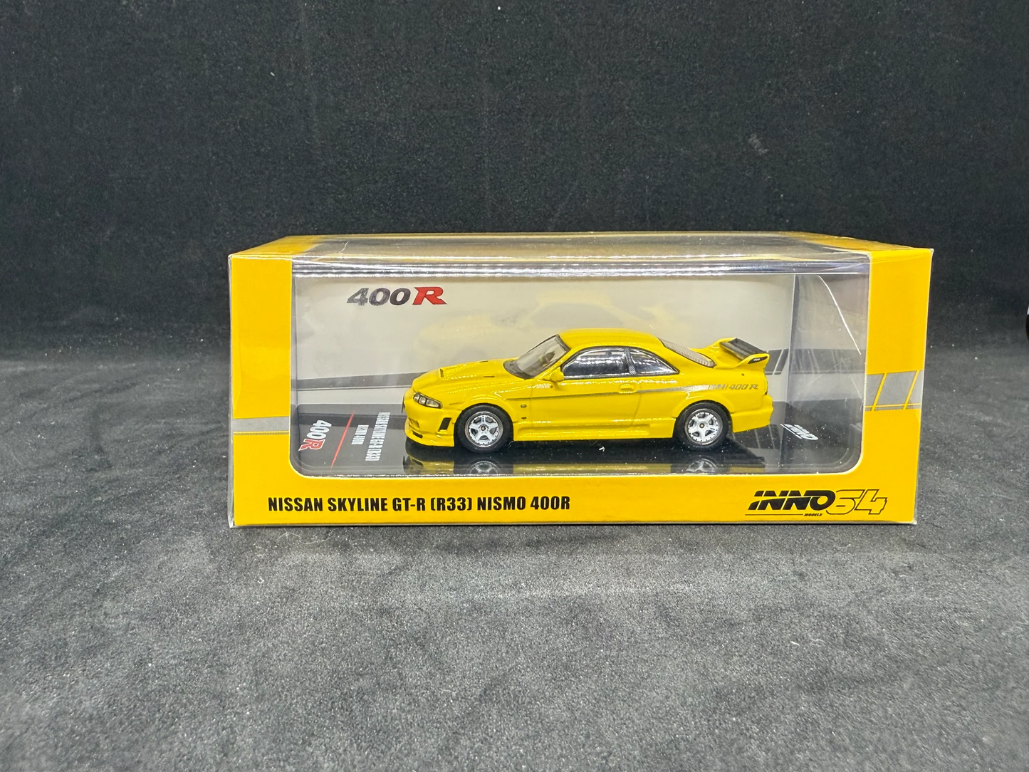 Inno64 Nissan Skyline GT-R (R33) Nismo 400R Yellow HE