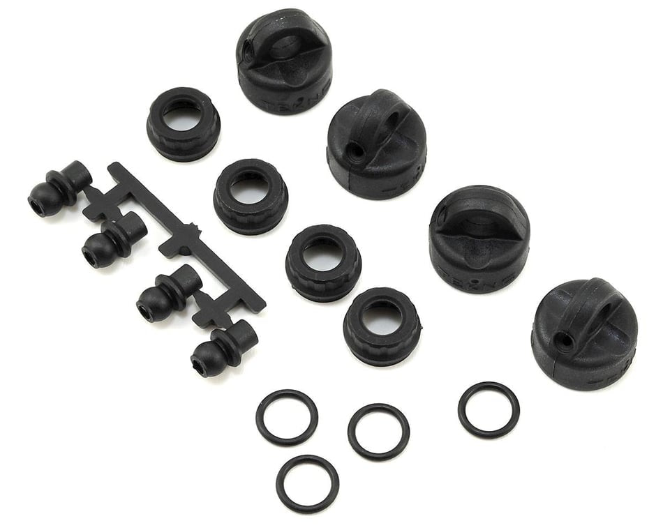 TKR6712 Tekno RC EB410/ET410 Shock/Cartridge Cap & Bushing Set (4)